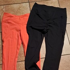 Fabletics Black and Orange Leggings Streamlined Athletic Wear
